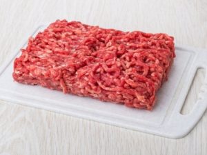 Ground Beef on a Cutting Board