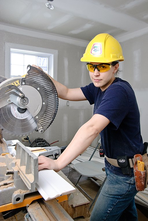 Worker Using a Saw