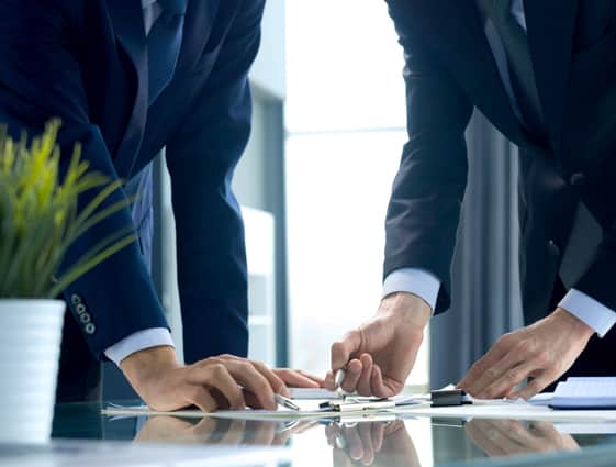 Two Attorneys Reviewing Paperwork